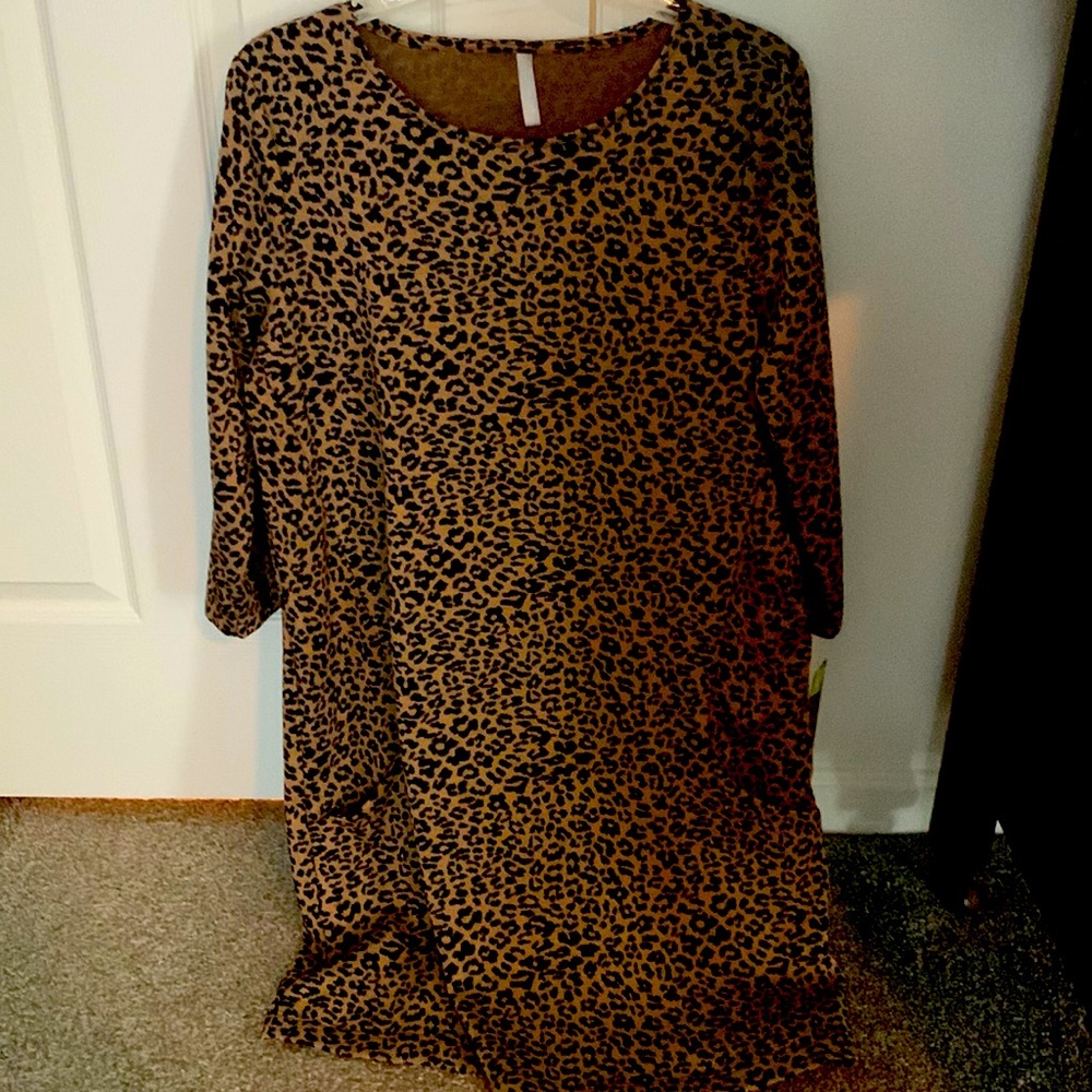 Massini size medium sweater dress with pockets.  Still have tags